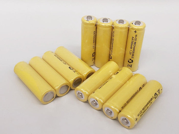 12-pack of dealonline.co.nz rechargeable AA Ni-Cd batteries, 1.2V, 700mAh, shown in a set with positive and negative terminals visible.
