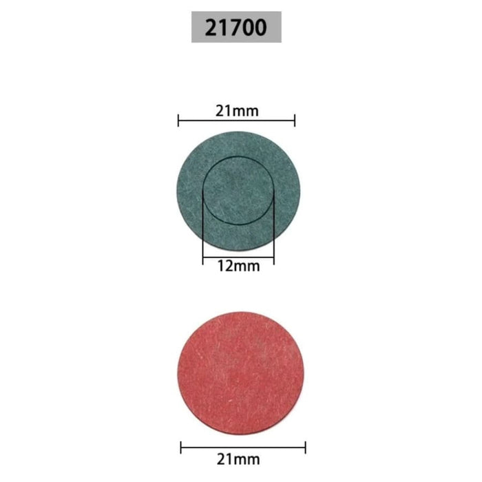 Close-up of 50 circular 21700 battery terminal gaskets from That Watch Shop, used for sealing and protecting battery terminals.
