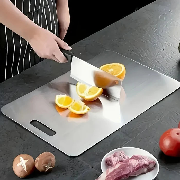 Two stainless steel chopping boards from ShopHub NZ in a set, designed for food preparation and kitchen use.