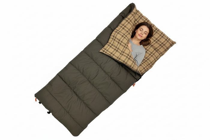 Cozy green sleeping bag with plaid interior, perfect for camping and outdoor adventures.