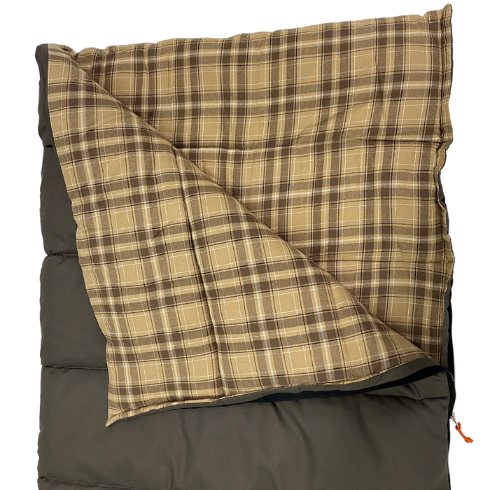 Plaid flannel sleeping bag, brown and beige, warm and cozy for camping or outdoor use.