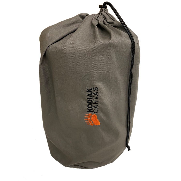 Kodiak Canvas durable gray storage bag with drawstring, ideal for camping gear or outdoor equipment.