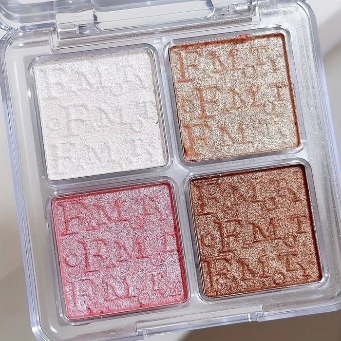 Four-color face highlighter palette by ShopHub NZ featuring shimmering shades for a radiant makeup look.