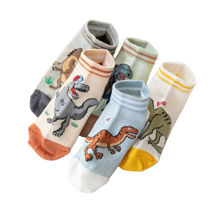 Five pairs of Habicare boys' dinosaur socks in assorted colors, soft and breathable, displayed in a neat stack.