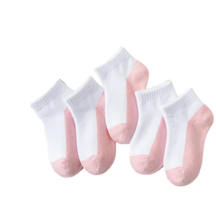 Five pairs of Habicare cotton socks for boys and girls aged 1 to 12, shown in various colors and sizes for kids' comfort.