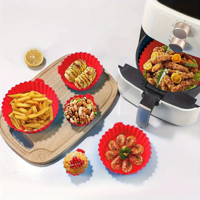 Six silicone non-stick air fryer mats with dual texture, heat resistant up to 450°F, designed as accessories for air fryers.