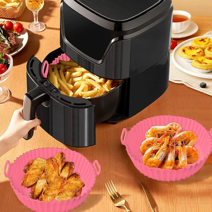 Six silicone non-stick air fryer mats with dual texture, heat resistant up to 450°F, ideal as air fryer accessories.
