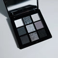 ShopHub NZ 9-colours eyeshadow palette with a variety of vibrant and neutral shades for versatile makeup looks.