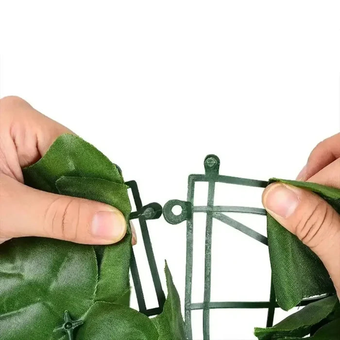 Artificial green leaf fence privacy panels by Habicare, 1M or 3M stainless steel with lush leaf design for outdoor privacy.