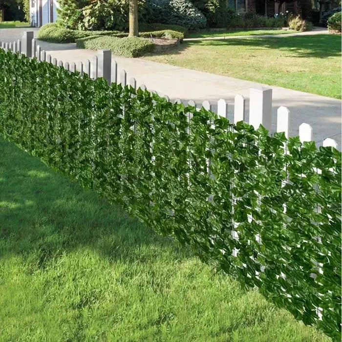 Artificial green leaf fence privacy panels by Habicare, 1m or 3m length, with realistic lush foliage for outdoor privacy.