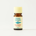 Bottle of Atlantic Aromatics Rose Absolute essential oil on a white background
