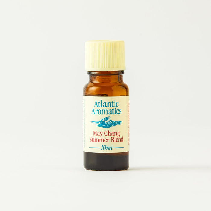 A 10ml amber glass bottle of Atlantic Aromas May Chang Summer Blend essential oil with a pale yellow cap and cream label, set against a plain white background.