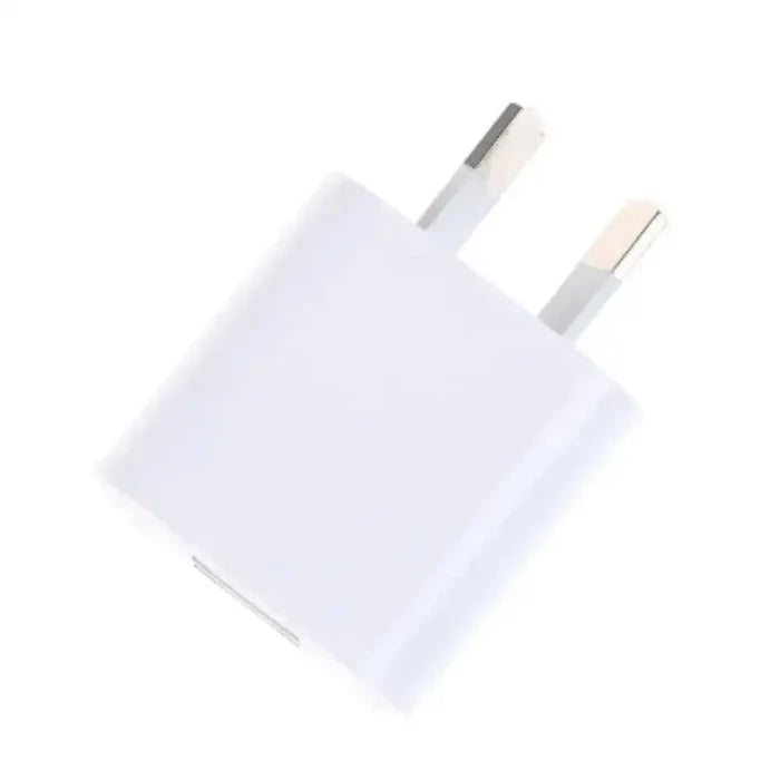 Habicare 9eight5 AU Plug 5V 2A Dual USB Charger plugged into a power outlet for fast device charging.