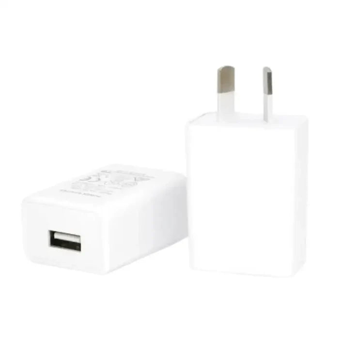 Habicare AU travel adapter with USB charger, 5V 1A/2A, compact TWS design for international travel and device charging.