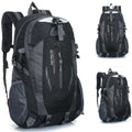 Black and grey 9eight5 backpack with multiple compartments and padded straps, designed for everyday use and travel.