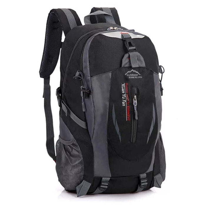 Black and grey 9eight5 backpack with zipper closure, showing front view and adjustable straps.