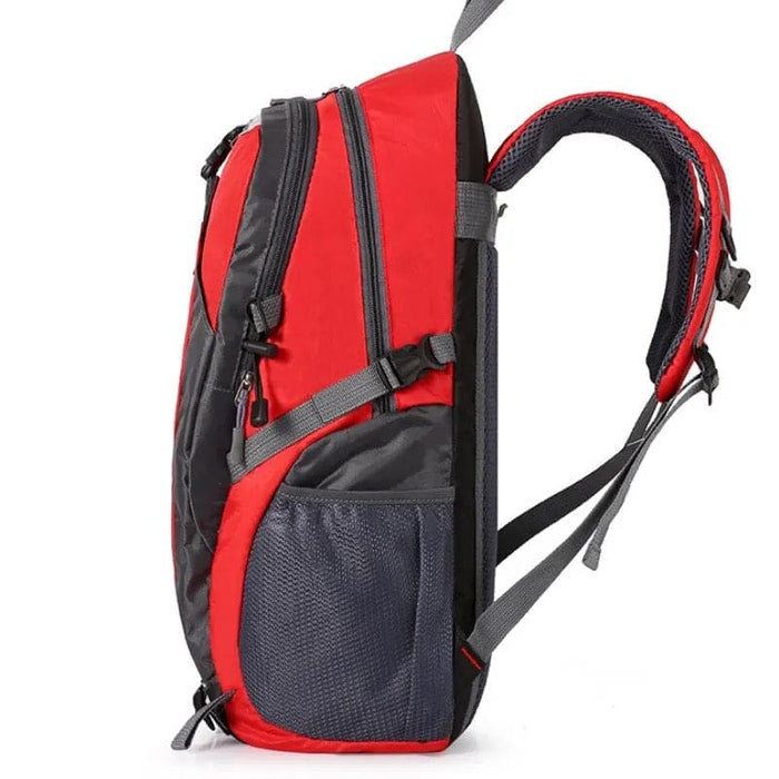 Red and black 9eight5 backpack with adjustable straps and multiple compartments, designed for everyday use.