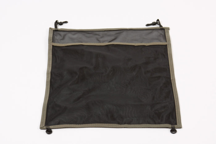 Black mesh storage bag with olive green trim, durable material for organizing essentials.