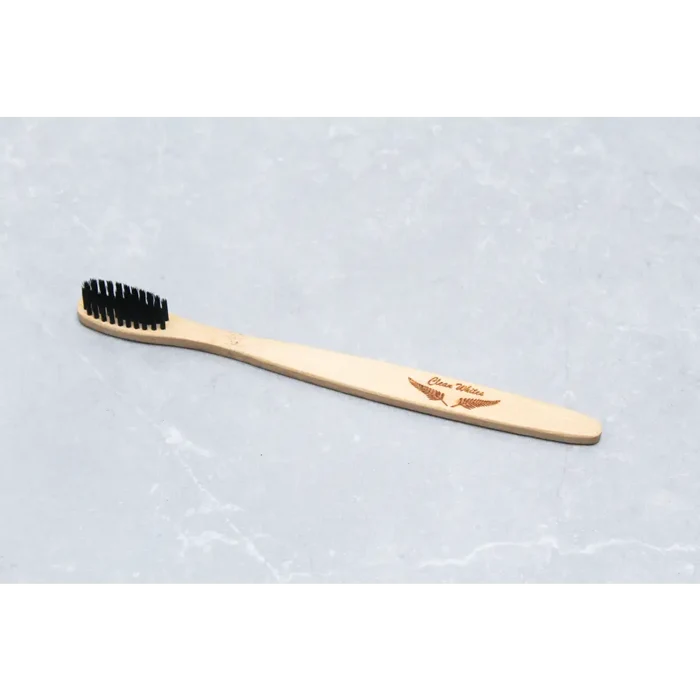 Clean-Whites bamboo toothbrush with natural bamboo handle and soft bristles, designed for eco-friendly oral hygiene.
