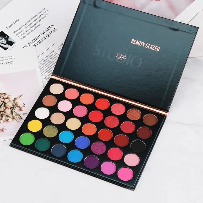 Beauty Glazed eyeshadow palette with 35 vibrant colors, featuring a variety of shades for versatile makeup looks.