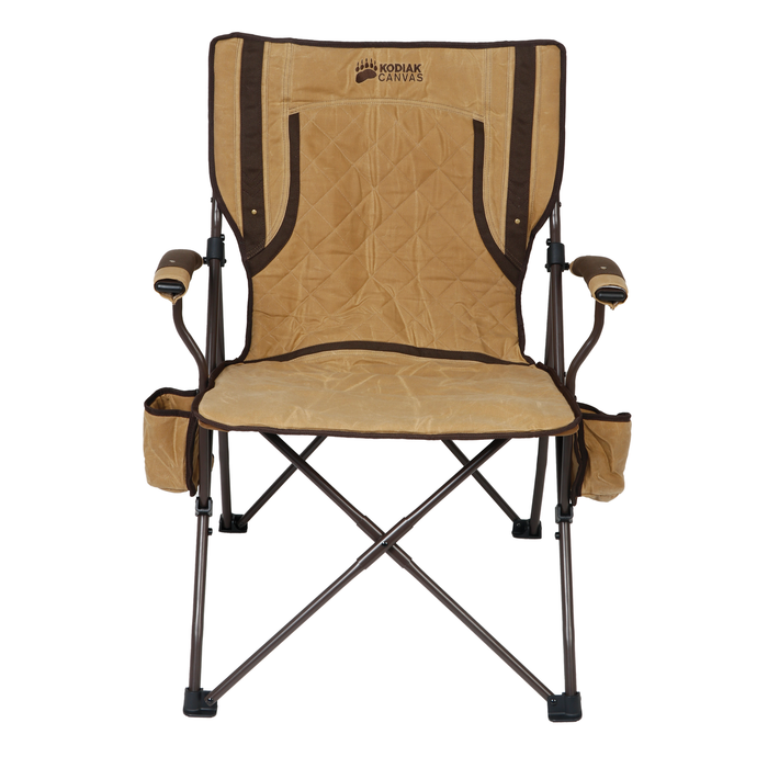 Kodiak Canvas folding chair in tan with quilted fabric and side pocket, perfect for outdoor use.