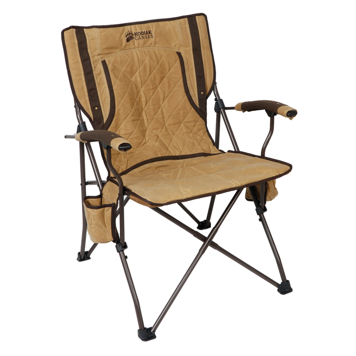 Cozy Kodiak Canvas camping chair in tan, featuring padded seat, sturdy frame, and side pocket for convenience.