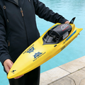 Large 74cm high-powered RC racing boat by dealonline.co.nz, sleek design, ready for high-speed water racing.