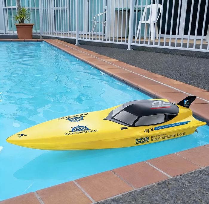 Large 74cm high-powered RC racing boat by dealonline.co.nz, sleek design and vibrant colors, ideal for high-speed water racing.