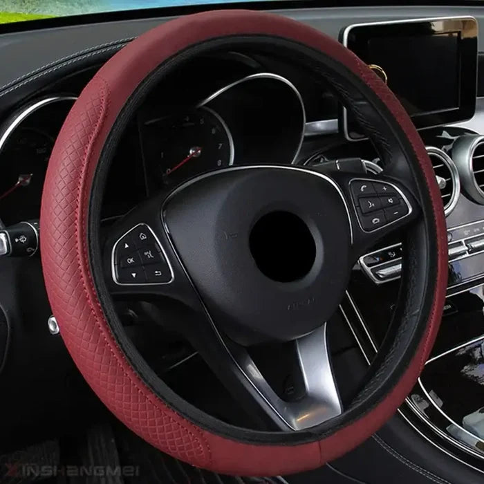 Habicare braided steering wheel cover in wine red with a textured, colorful braided design for a stylish car interior.