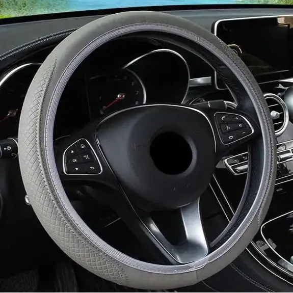 Gray Habicare braided steering wheel cover with colorful woven design, fits standard car steering wheels.