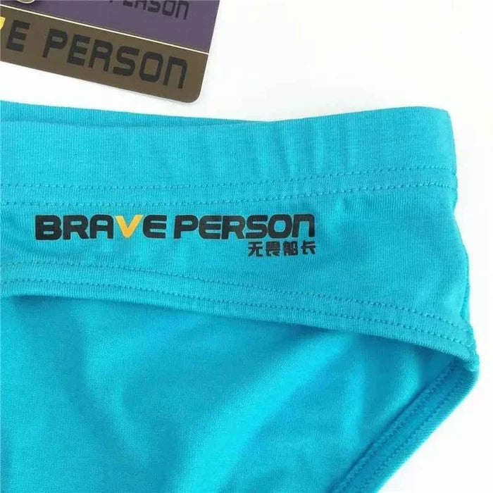 Sexy men's briefs from ShopHub NZ featuring cotton fabric, U convex pouch, and low waist design for comfortable fit.