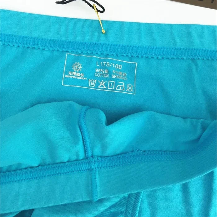 Men's briefs by ShopHub NZ featuring cotton fabric, low waist design, and U convex pouch for comfort and support.