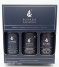 A gift box containing three 100ml bottles of Burren Balsamics, with labels indicating the flavors: Balsamic Vinegar of Modena, Black Garlic, and Roast Onion.
