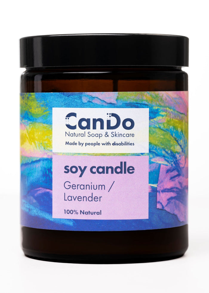 Soy candle with colorful label featuring 'CanDo' brand on a white background