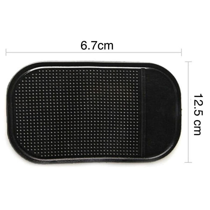 9eight5 car dashboard anti-slip mat holding phone and tablet securely on the vehicle's dashboard surface.
