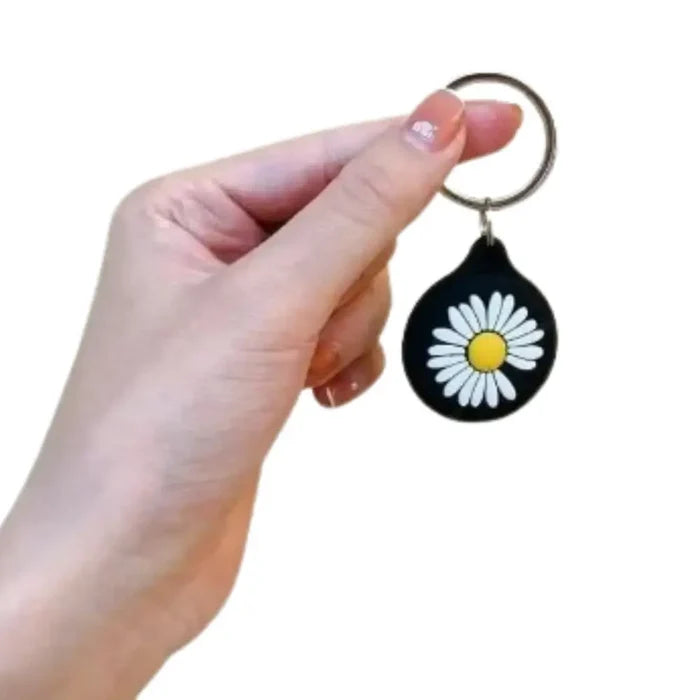Habicare cartoon silicone AirTag keychain holder with TWS design, flexible and colorful for easy tracking and protection.