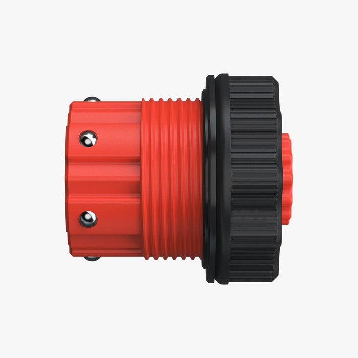 The HALOBLK Store Centerlock Hub Insert-Left is a red and black industrial connector with a ridged, cylindrical body and metal screws, shown from the side on a white background.