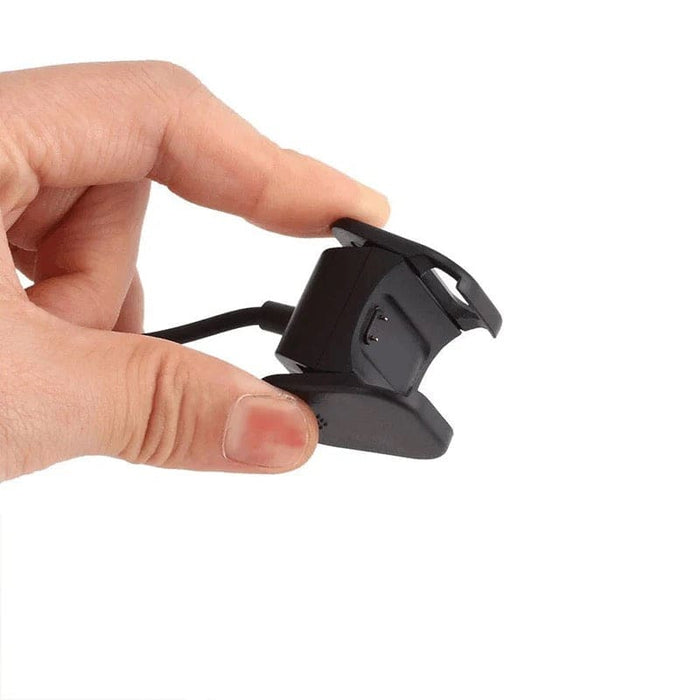 Fitbit Charge 3/4 charger compatible with Fitbit fitness trackers, featuring a USB connection and charging port for easy power supply.