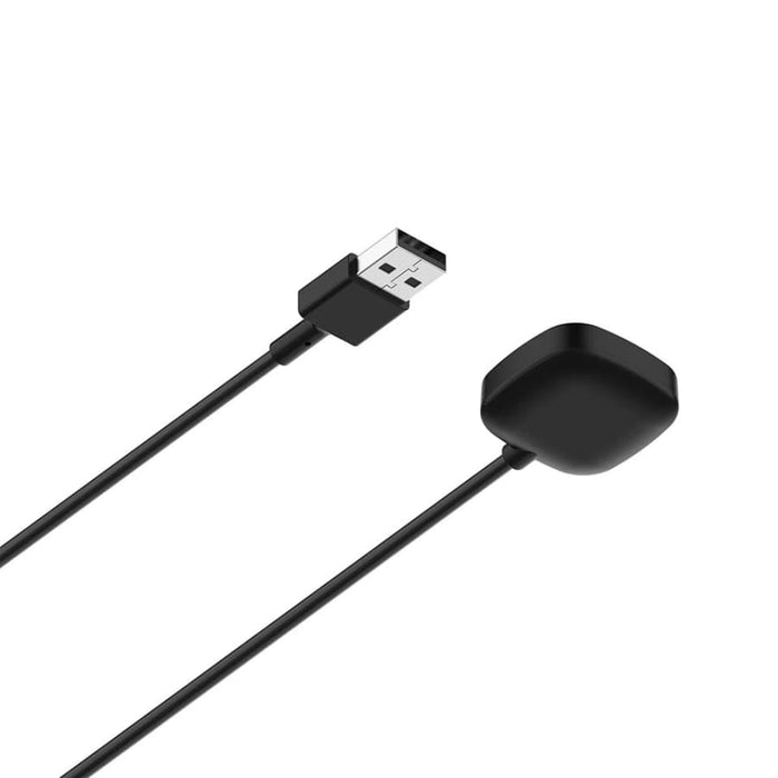 Fitbit Versa 4, Versa 3, Sense 2, and Sense charger by That Watch Shop showing a USB charging cable and connector.