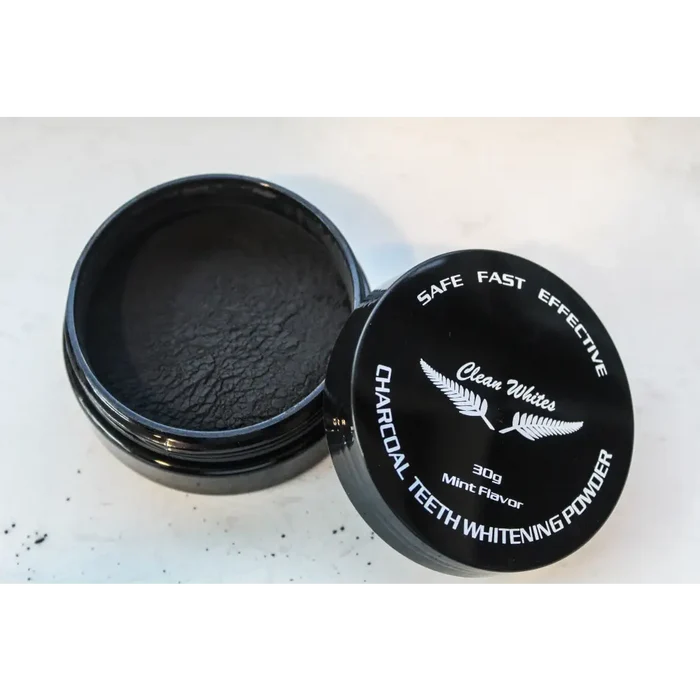 Clean Whites Charcoal Teeth Whitening Kit showing whitening gels, charcoal powder, and application tools for brighter teeth.