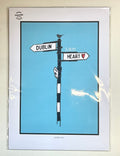 Framed artwork of a street sign with 'Dublin is my heart' on a blue background