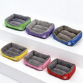 Colorful calming dog bed in size M, 54cm, with warming and washable features, designed for comfort and relaxation.