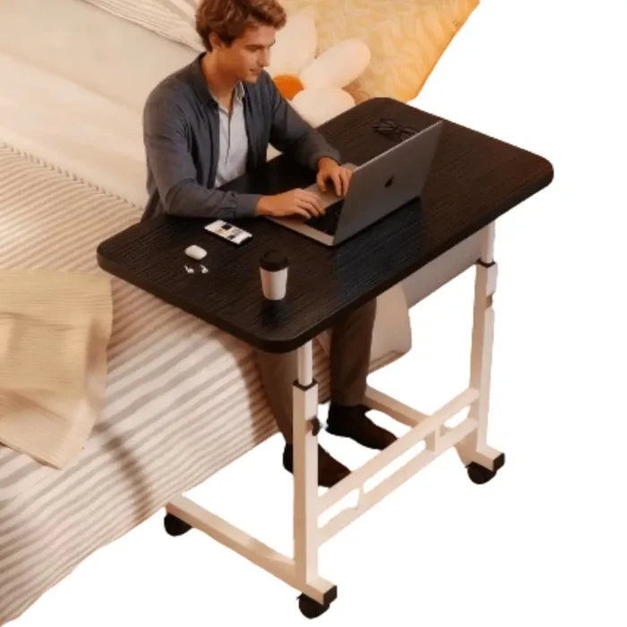 Habicare compact adjustable bedside work desk with four-wheel mobile design, ideal for flexible work and easy mobility.