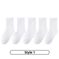 Set of five Habicare cotton sport socks in various colors for children aged 3 to 13, featuring comfortable, breathable fabric.