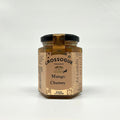 A jar of Crossogue Mango Chutney with a label that includes the product name and a description, set against a white background.