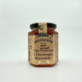 A jar of Crossogue Pink Grapefruit & Champagne Marmalade with a label and branding visible.
