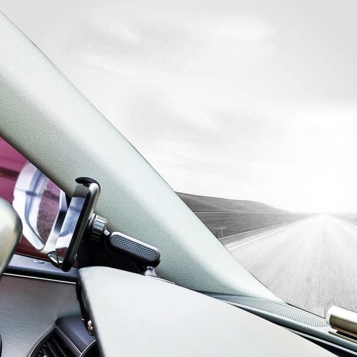 9eight5 dashboard hood phone holder attached to a car dashboard, secure mount for smartphones and tablets.