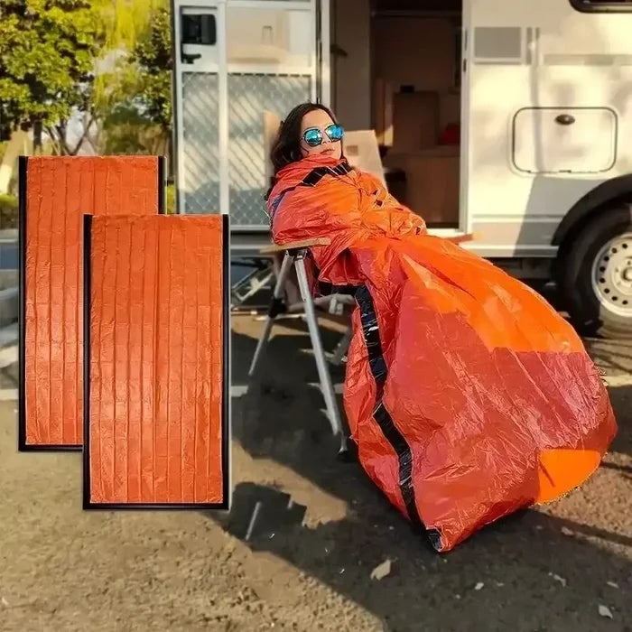 Orange Habicare SS emergency sleeping bag designed for outdoor survival and emergency situations.