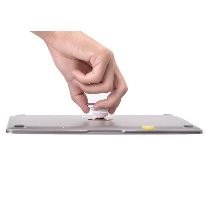 Gold expanding finger grip for phone and tablet accessories by 9eight5, showing its adjustable design and sleek finish.