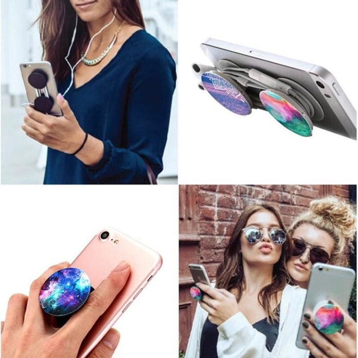 Silver expanding finger grip for phone and tablet from 9eight5, with white and purple accents, showing adjustable design and secure hold.